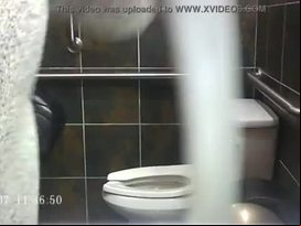 Girl with glasses caught peeing