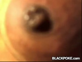 Sexy black babe presents her body close up