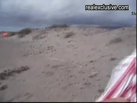 Helping each other on the beach